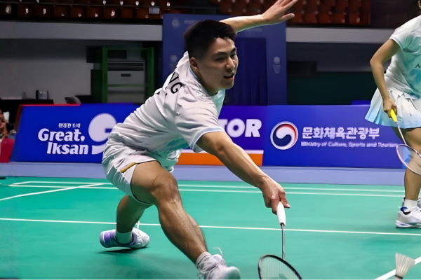 National Squad Recall star Jimmy Wong lunges for a low return during an international match.