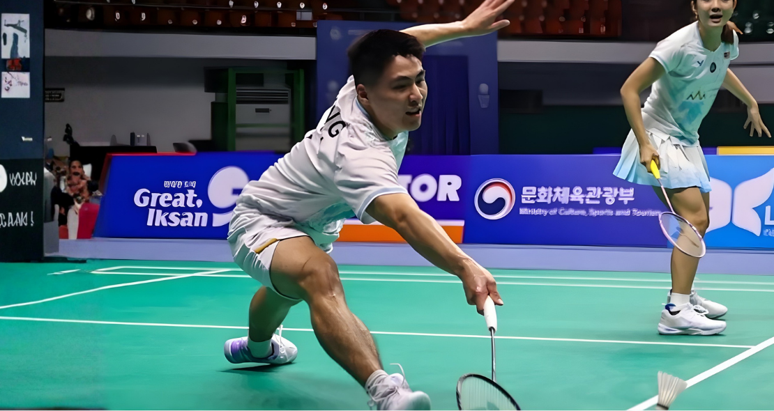 National Squad Recall star Jimmy Wong lunges for a low return during an international match.