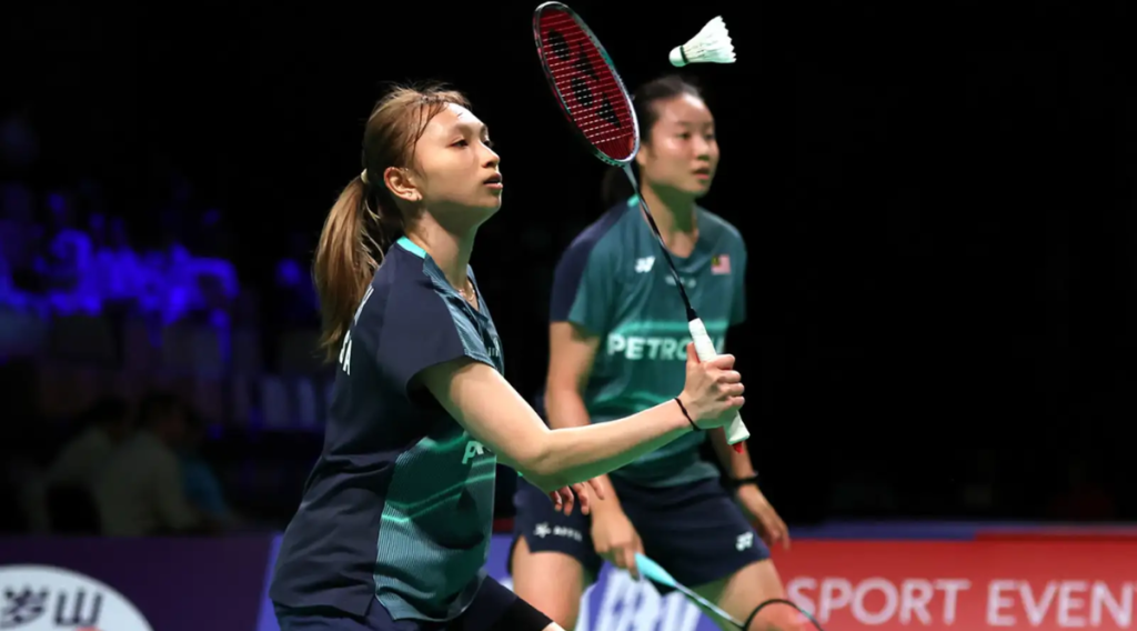 Malaysian teenage badminton players Zi Yu Low and Noraqilah Maisarah celebrating a point at the Uber Cup 2026.