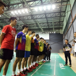 Malaysian national team players listen to coach during intensive training session