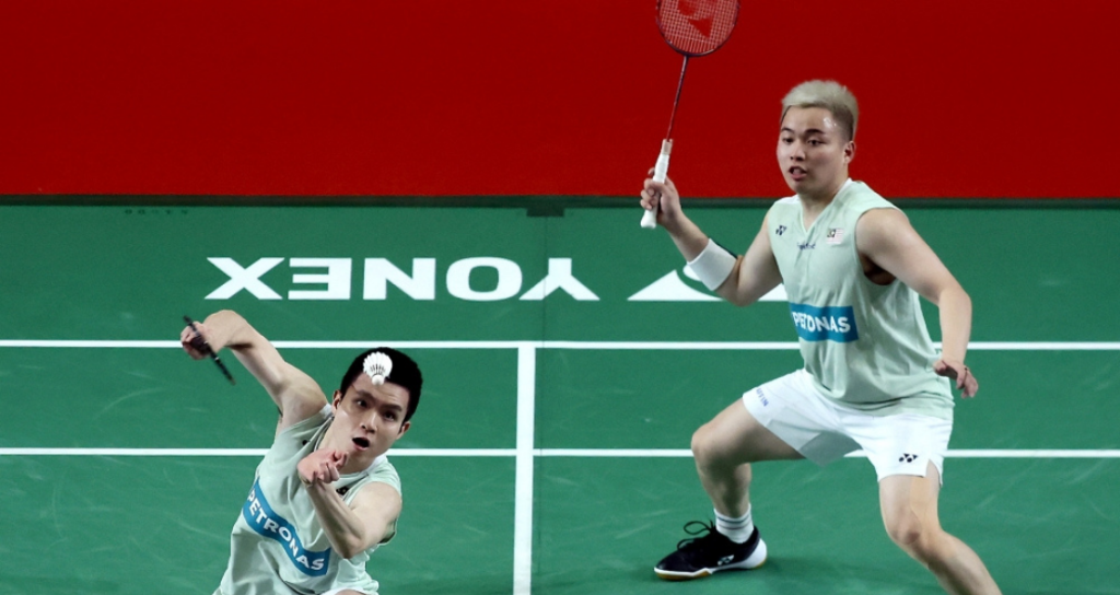 Malaysia Masters 2026 featuring Aaron and Wooi Yik in a high-stakes doubles rally.