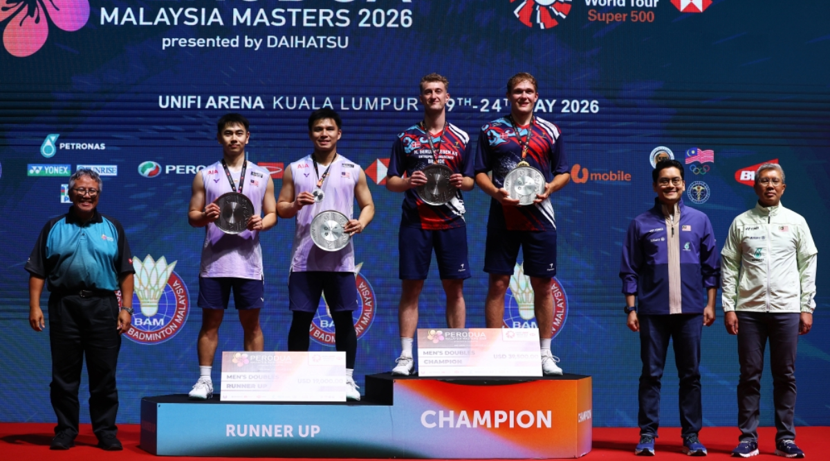 Goh Sze Fei and Nur Izzuddin Rumsani receive silver medals alongside Denmark’s Daniel Lundgaard and Mads Vestergaard with gold medals after the Malaysia Masters 2026 final in Bukit Jalil