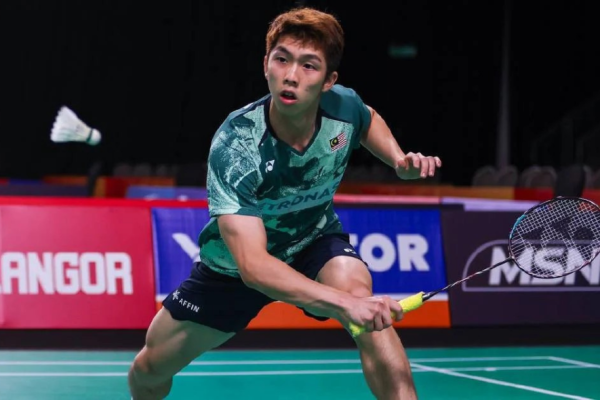 Macau Open campaign featuring Eogene Ewe in high-intensity action during a singles match.