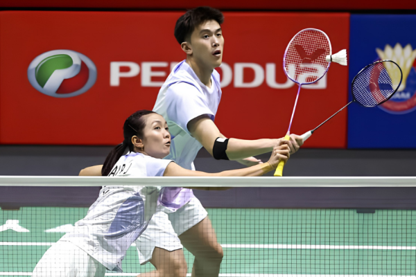 Mixed Doubles Breakthrough featuring Hoo Pang Ron and Lai Pei Jing during an intense match.