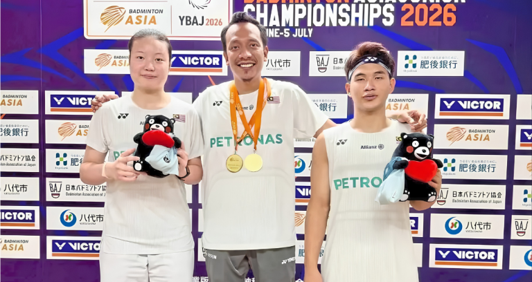 Asian Junior Championships title celebration featuring Ahmad Redzuan Low Zi Yu and coach Hazwan Jamaluddin.