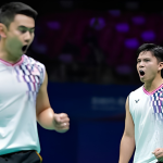Sze Fei-Izzuddin Target showing Goh Sze Fei and Nur Izzuddin Rumsani celebrating passionately on the court.