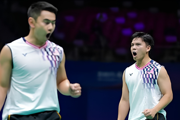Sze Fei-Izzuddin Target showing Goh Sze Fei and Nur Izzuddin Rumsani celebrating passionately on the court.