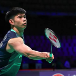 Jun Hao China Open showing Leong Jun Hao poised to return the shuttlecock during first round action.