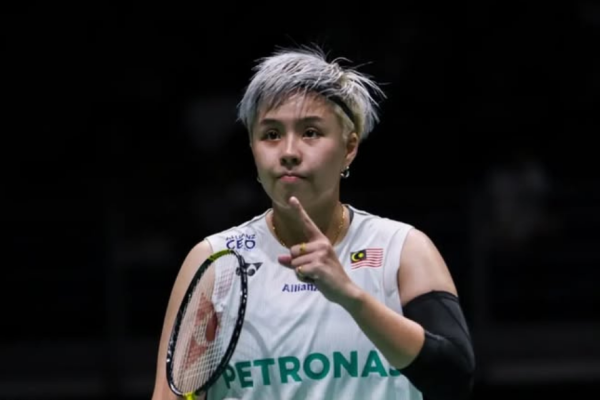 Ee Wei Rehabilitation Process showing Toh Ee Wei with short silver hair gesturing with her index finger on court.