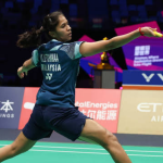 Letshanaa Elite Level Transition showing K Letshanaa lunging low on the green court.