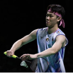 Zii Jia Taiwan Open showing Lee Zii Jia holding the shuttlecock to serve.