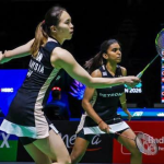 Pearly-Thinaah China Open showing Pearly Tan and M Thinaah playing together on court in Changzhou.