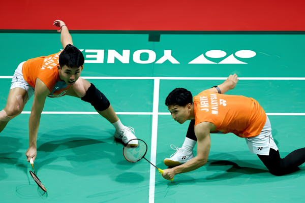 Japan Open preparation featuring Wan Arif and Yap Roy King in action during a doubles match.