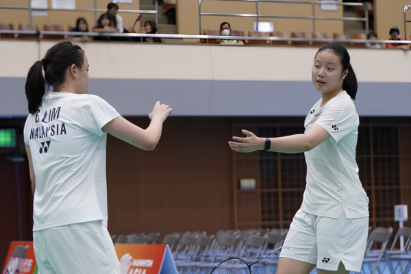 Asian Junior Championships featuring Low Zi Yu and Genevie Lim celebrating on court.