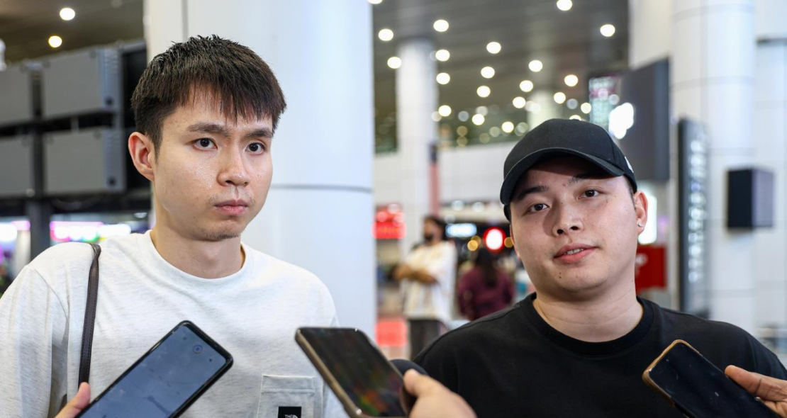 Aaron-Wooi Yik Exit showing Soh Wooi Yik and Aaron Chia speaking to reporters at KLIA.