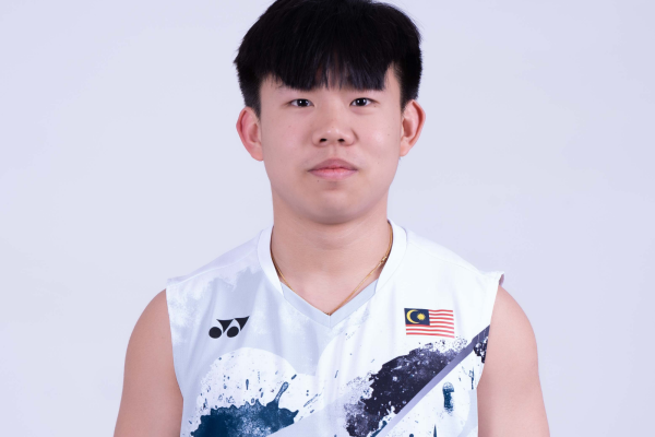Aaron Tai Wei Qin professional badminton profile image showing the Malaysian Men's Double player smiling