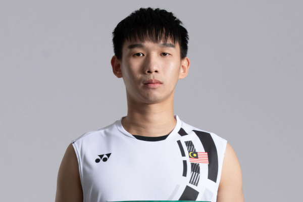 Choong Hon Jian professional badminton profile image showing the Malaysian Men's Double player smiling
