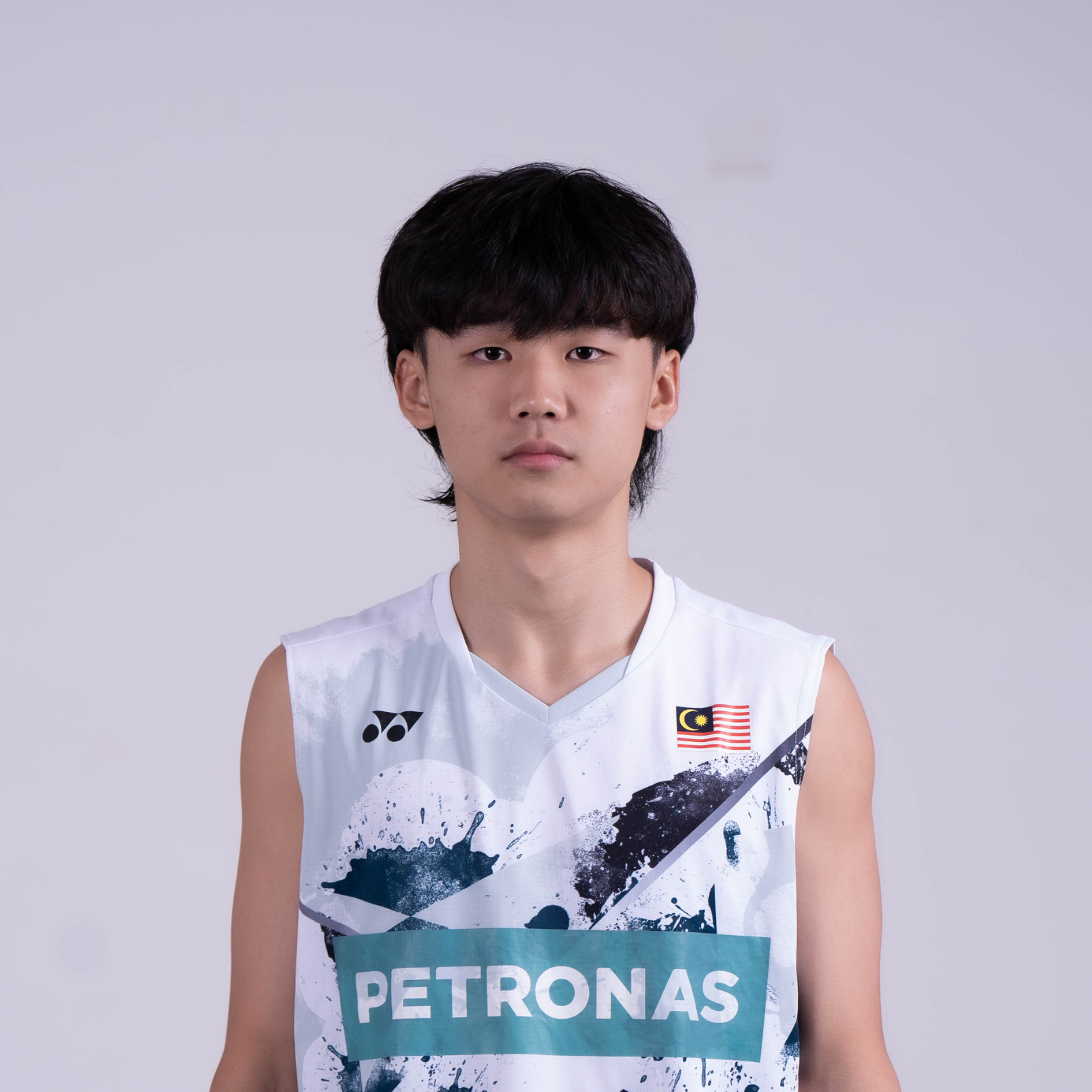 Goh Yi Qin professional badminton profile image showing the Malaysian Men's Double player smiling