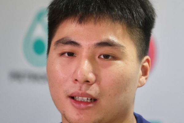 Jimmy Wong professional badminton profile image showing the Malaysian Mixed Double player smiling