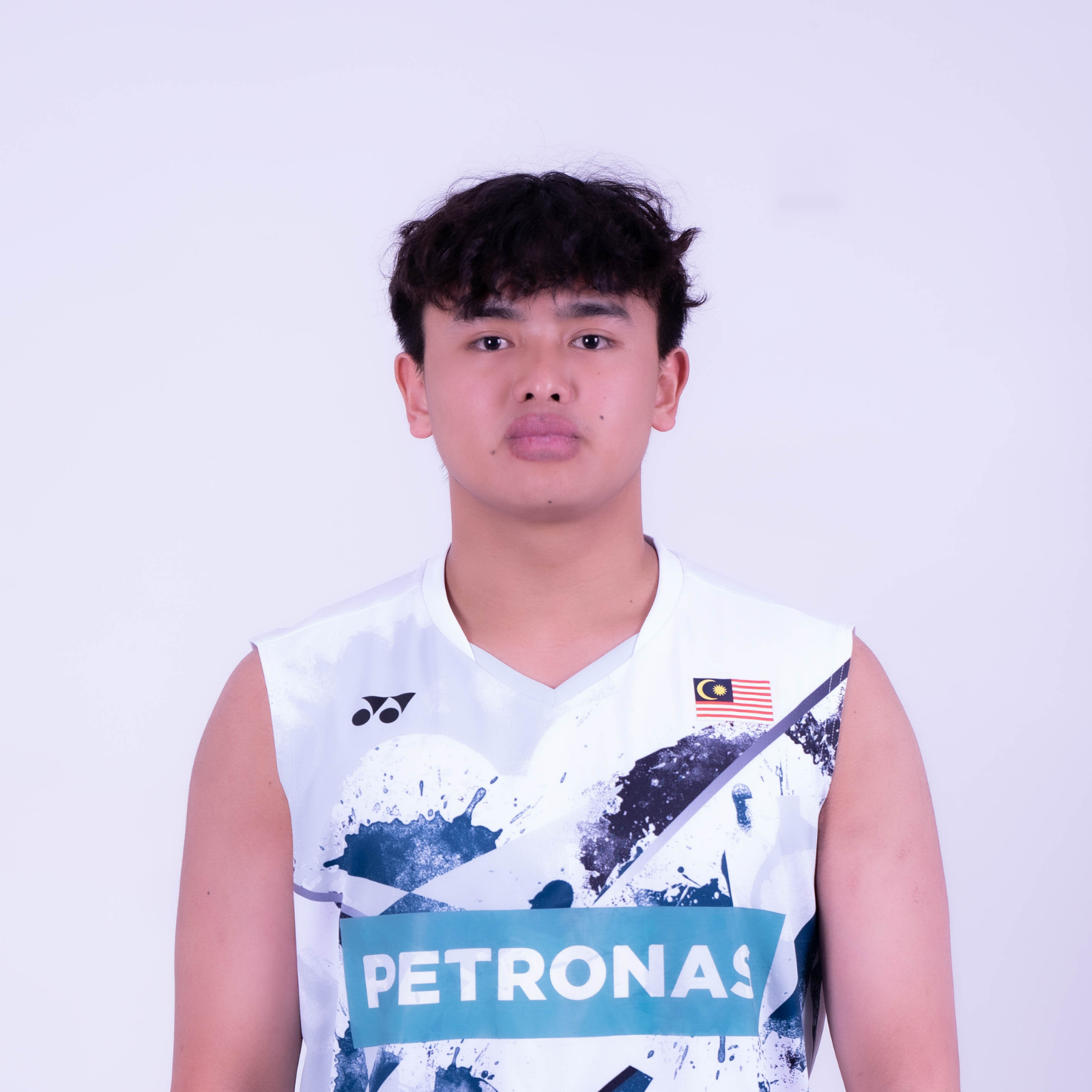 Kang Khai Xing professional badminton profile image showing the Malaysian Men's Double player smiling