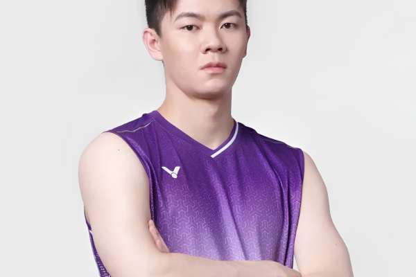 Lee Zii Jia professional badminton profile image showing the Malaysian singles star posing with arms crossed against a white studio background.