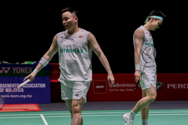 Aaron-Wooi Yik Future showing Aaron Chia and Soh Wooi Yik looking pensive on court in Kuala Lumpur.
