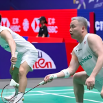 Aaron Chia Scratch Partnership showing Aaron Tai and Aaron Chia in action on the green court.