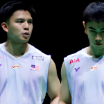 Sze Fei-Izzuddin Worlds Victory showing Goh Sze Fei and Nur Izzuddin Rumsani in active ready stance.
