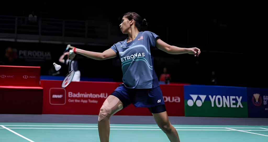 Letshanaa World Championships showing K Letshanaa executing a deep lunge on the green court.