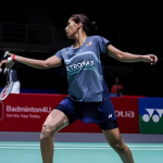 Letshanaa World Championships showing K Letshanaa executing a deep lunge on the green court.