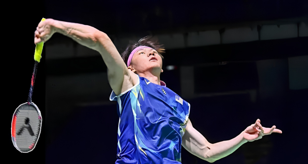 Zii Jia Korea Masters showing Lee Zii Jia executing a high jump smash on the green court.