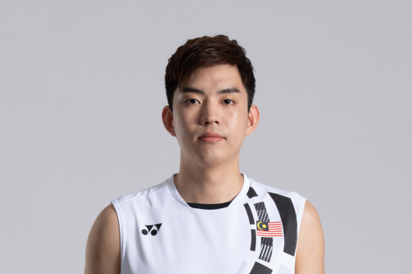 Man Wei Chong professional badminton profile image showing the Malaysian Men's Double player smiling