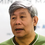 Herry IP Worlds Warning showing Herry Iman Pierngadi speaking to the media in Kuala Lumpur.