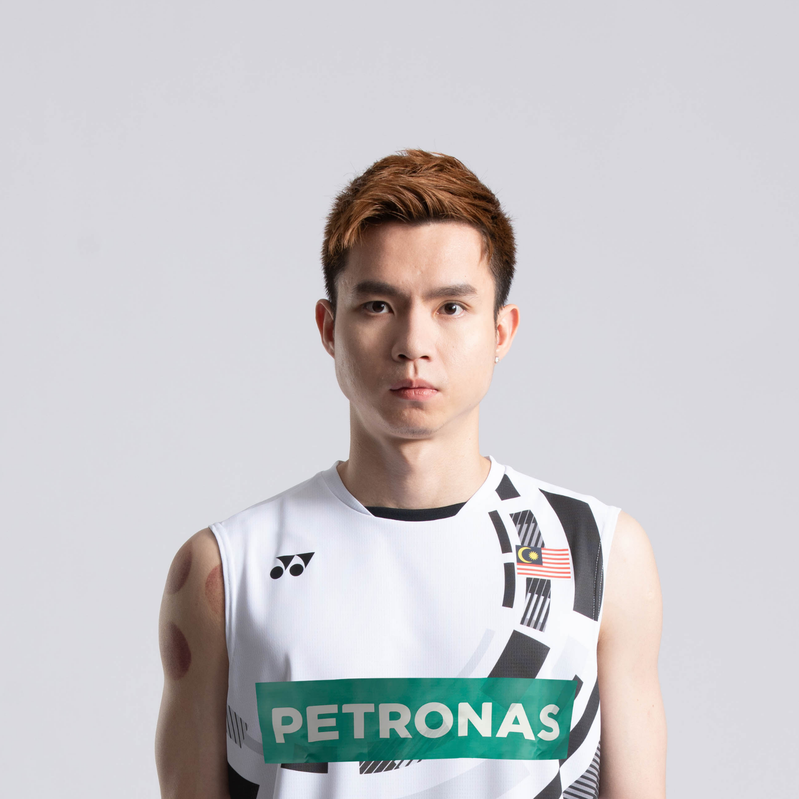 Soh Wooi Yik professional badminton profile image showing the Malaysian Men's Double player smiling