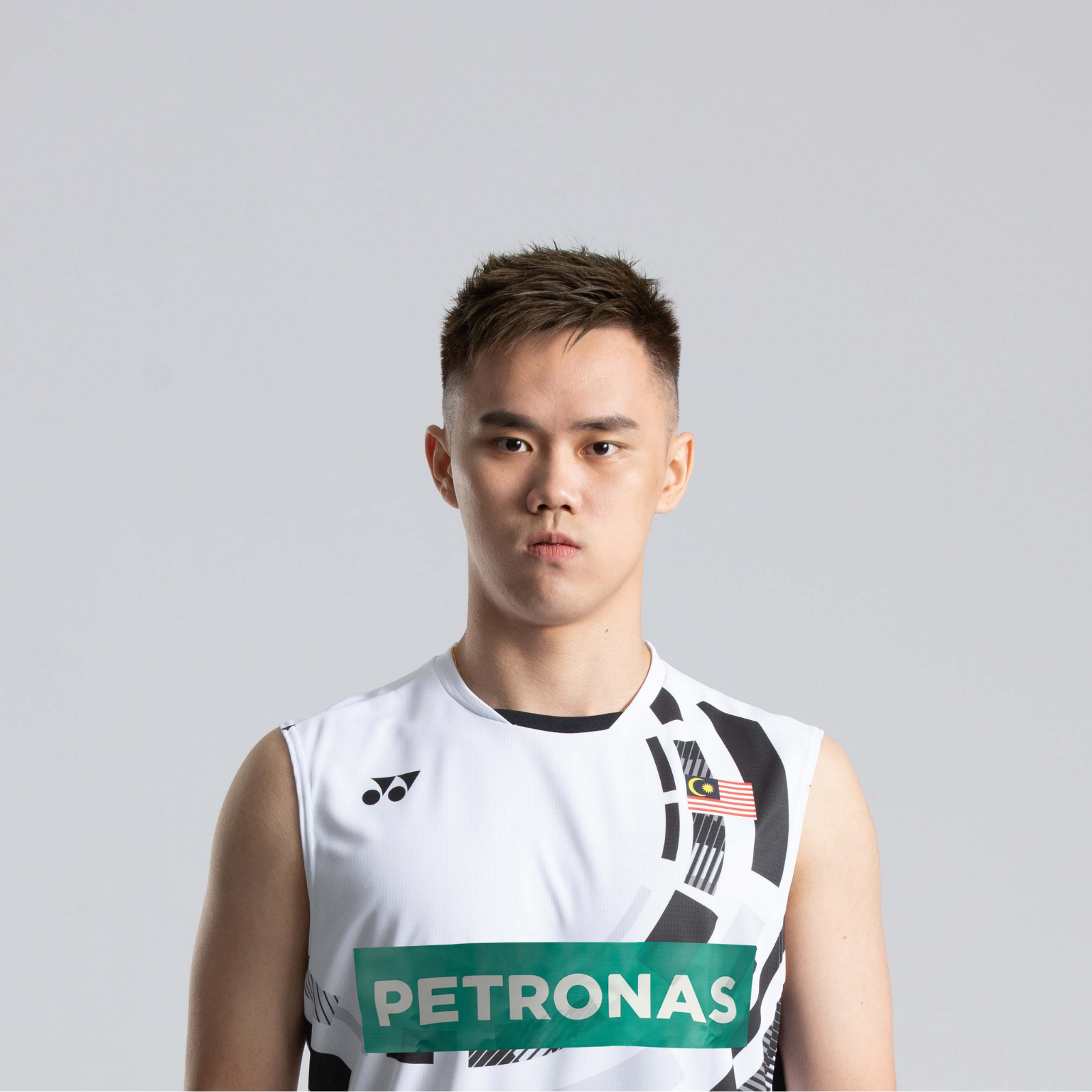 Tee Kai Wun professional badminton profile image showing the Malaysian Men's Double player smiling