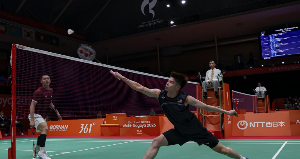 Leong Jun Hao executes a low net reach against Jonatan Christie during their Asian Games men's singles match.