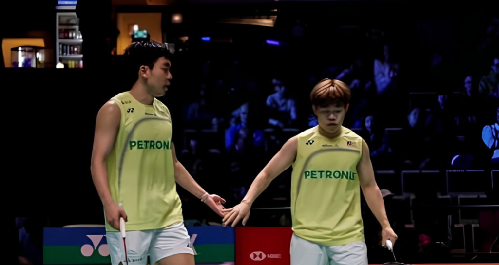 Malaysian men's doubles badminton players Aaron Tai and Yap Roy King on court at the HYLO Open 2026.