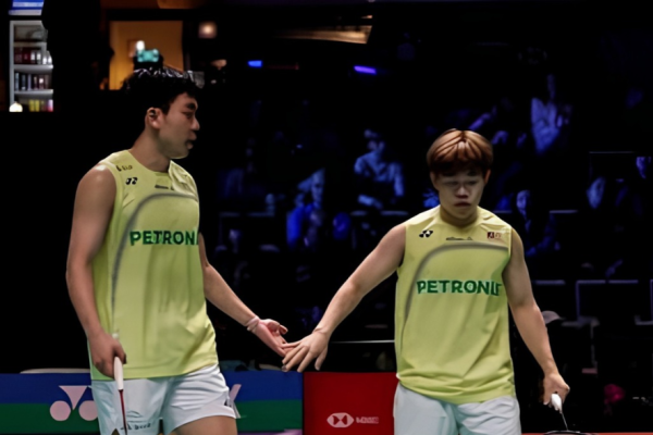 Malaysian men's doubles badminton players Aaron Tai and Yap Roy King on court at the HYLO Open 2026.