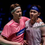 Anders Antonsen embraces Lee Zii Jia at the net following their Arctic Open semifinal match.